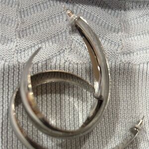 Long vintage silver plated metal earrings.